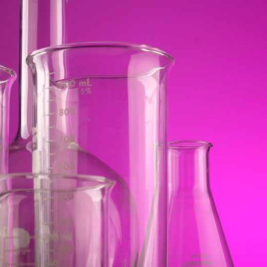 Laboratory glassware arranged on a bench