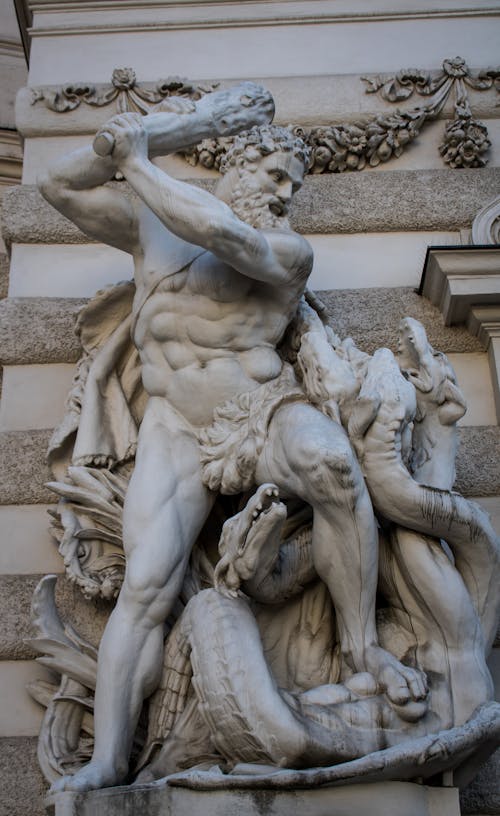 Close-up of Hercules and the Hydra Sculpture Carved on the Building Facade 