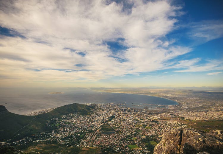 Aerial Photography Of Urban City Under Blue Sky