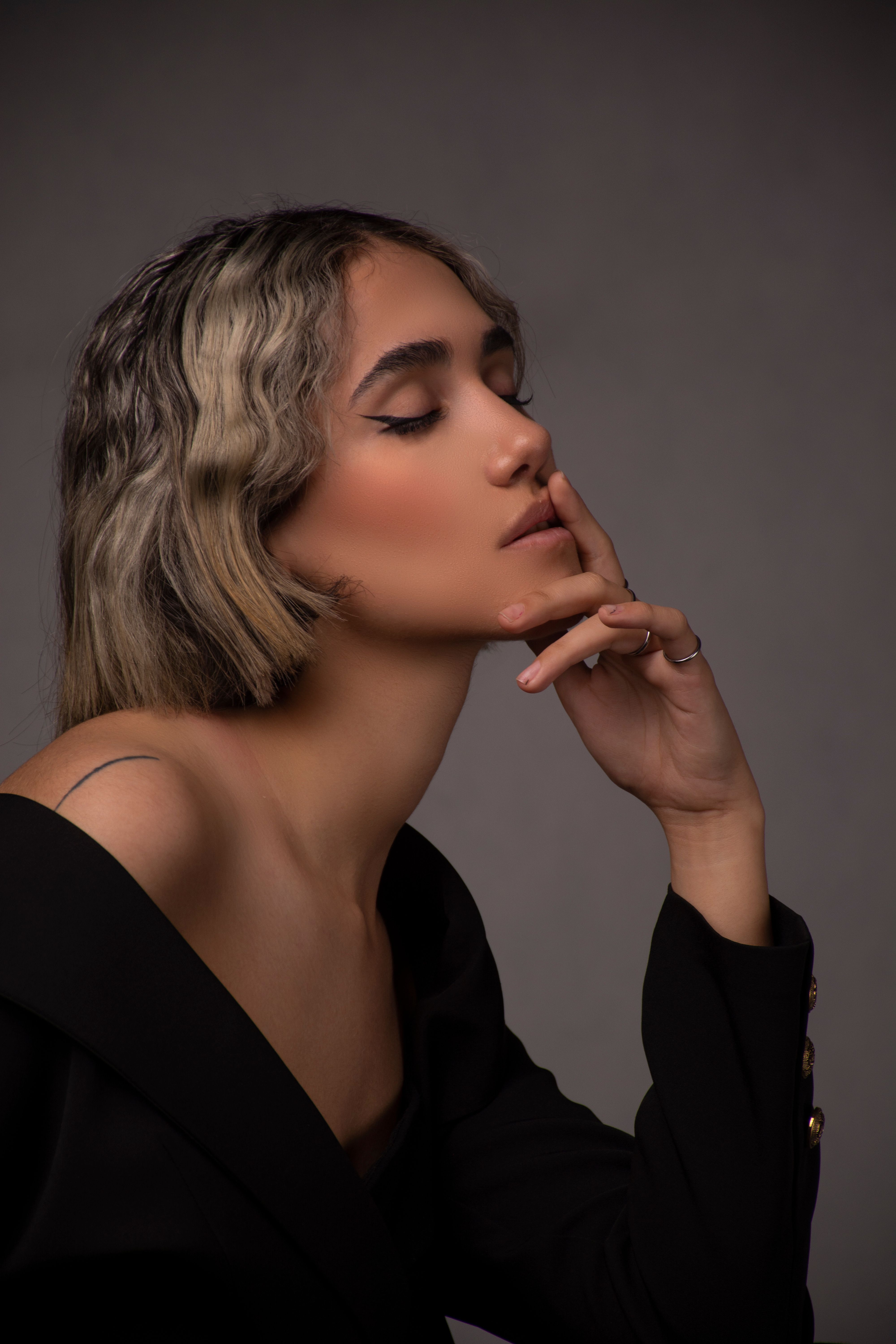 Close Up Photo of Woman with Her Hands on Her Face · Free Stock Photo
