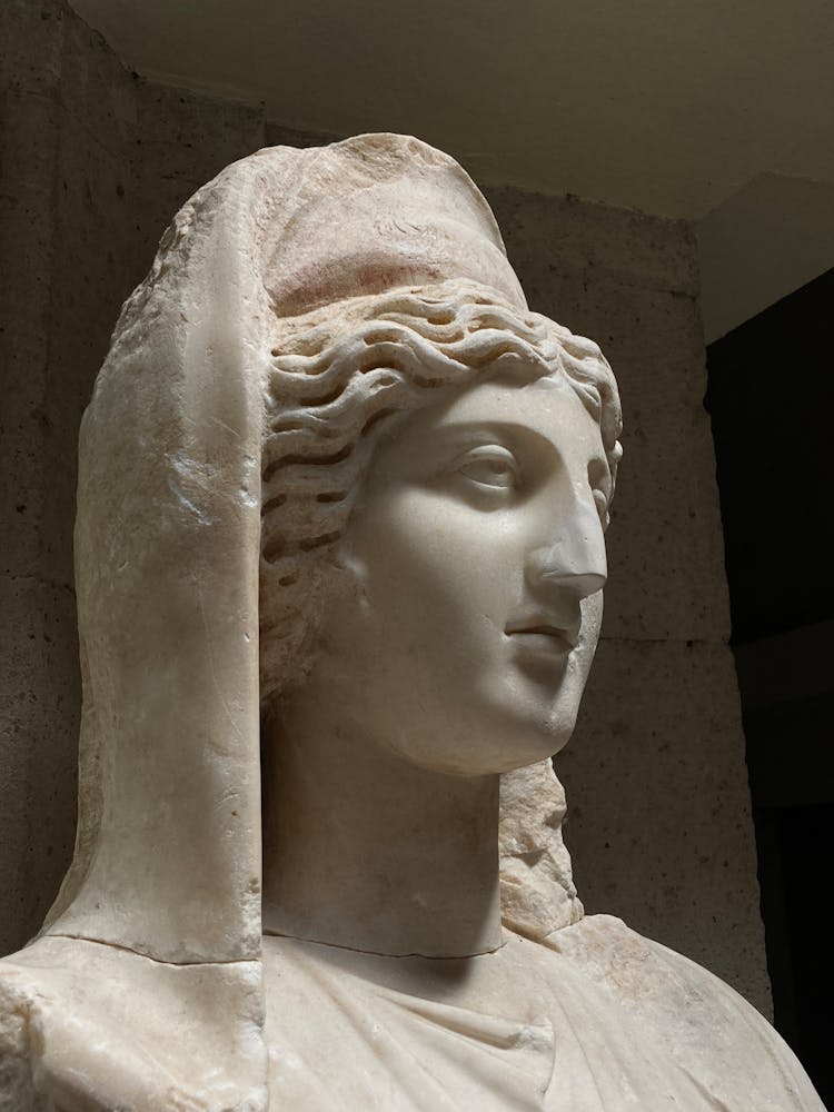 White Marble Statue Of Woman Wearing Veil