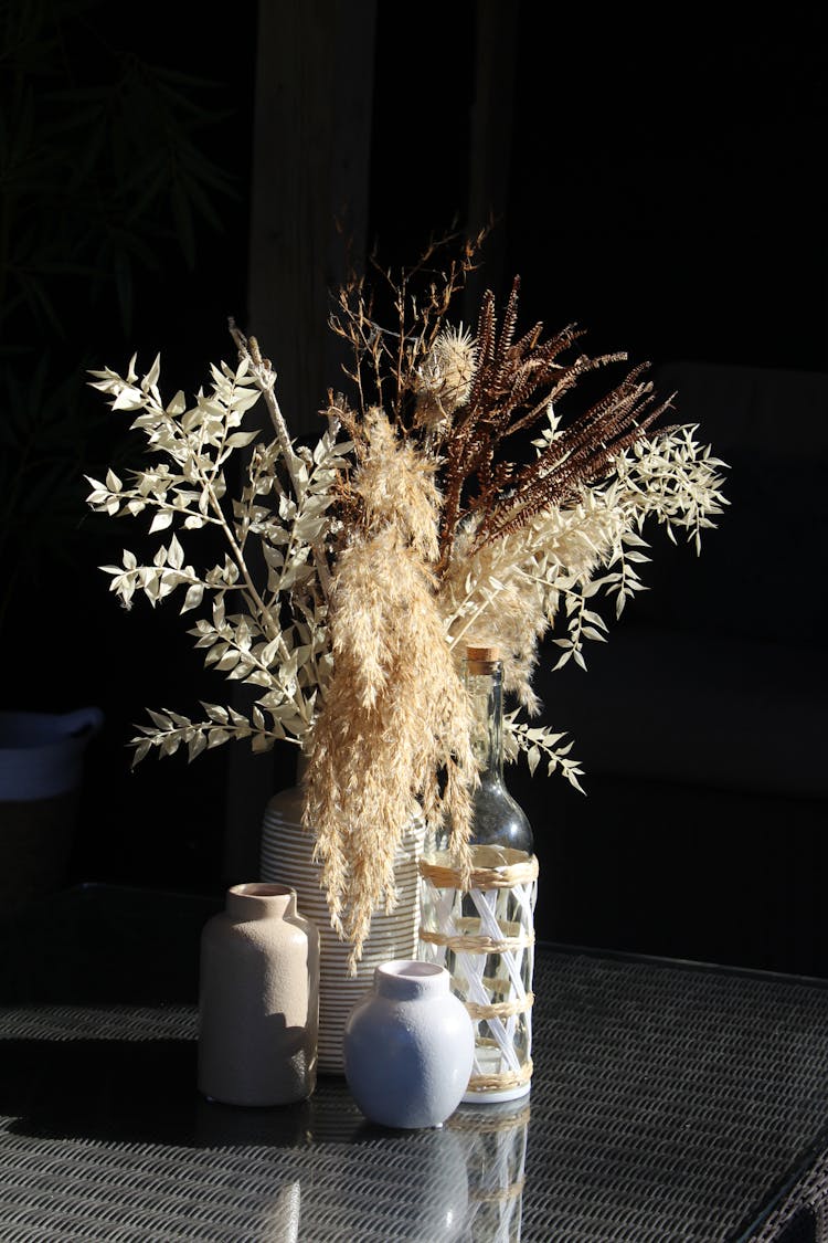 Minimalist Dried Flowers On Ceramic Vase