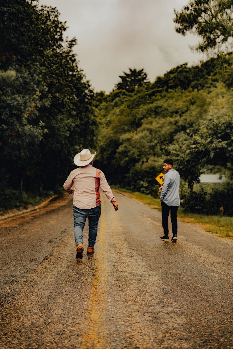 Men Walking On Road