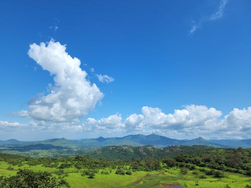 Безкоштовне стокове фото на тему «Аерофотозйомка, блакитне небо, гори»