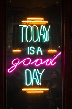 Bright neon sign displaying 'Today is a good day' for a motivational touch.