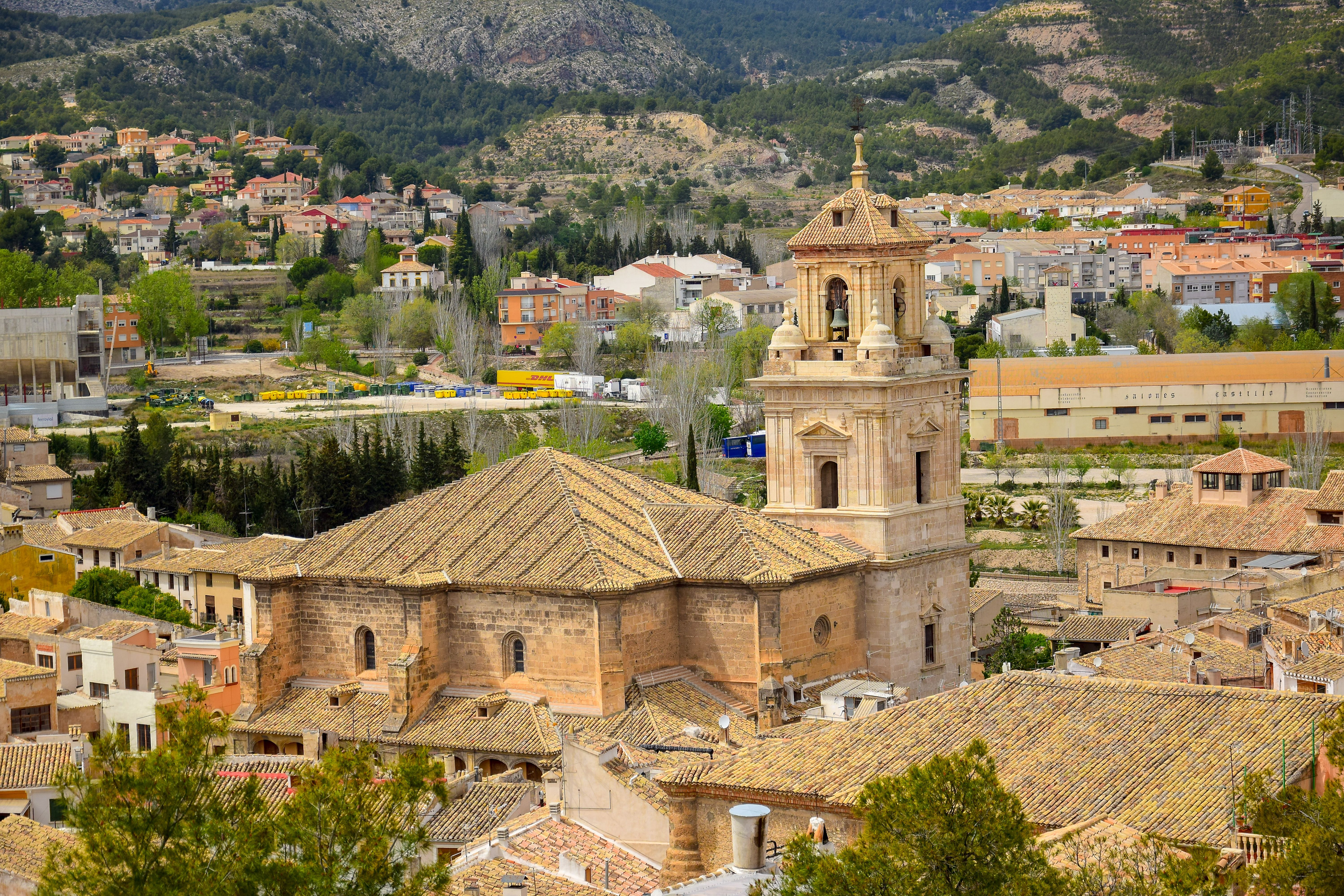 Aerial view of a historic church in Caravaca de la Cruz, Spain, showcasing its architecture.