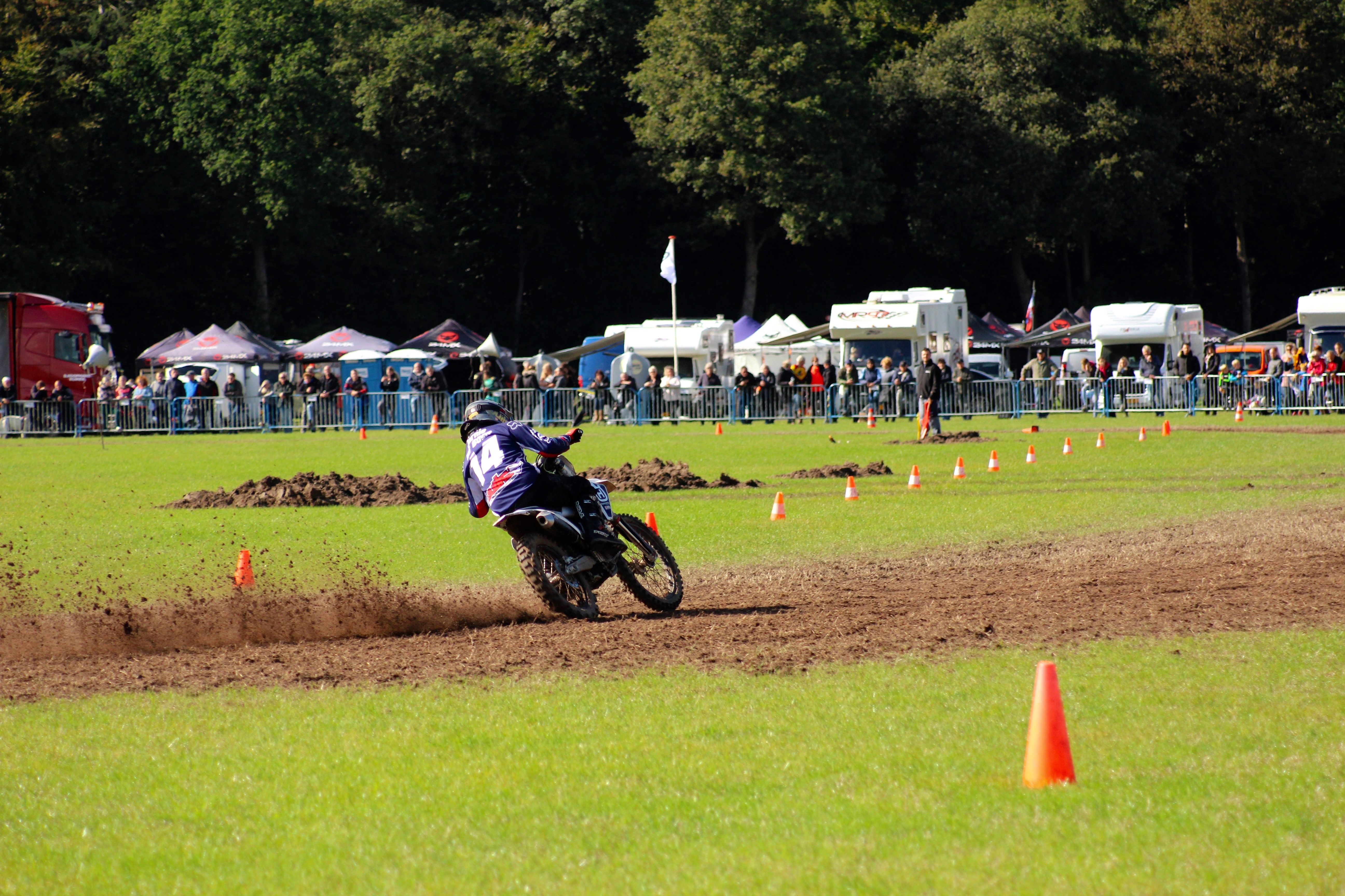 Person Riding a Motorcycle on a Track · Free Stock Photo