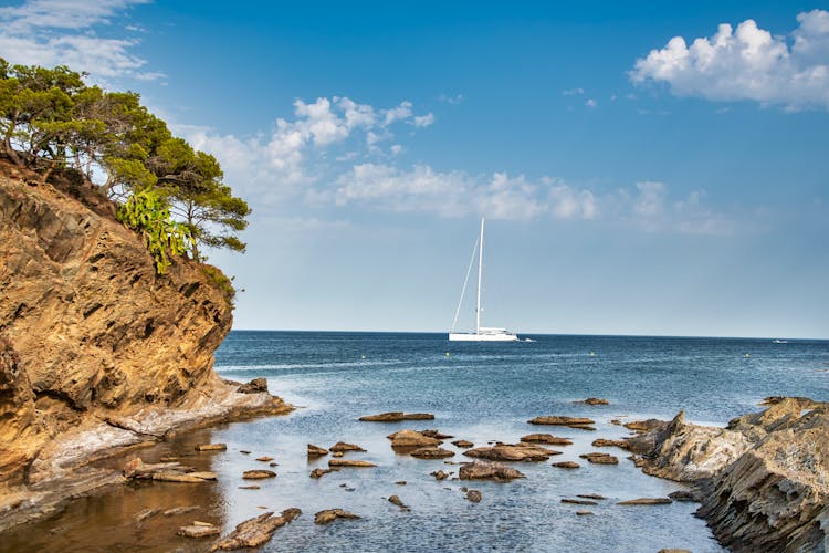 Sailboat On Sea Seen From River