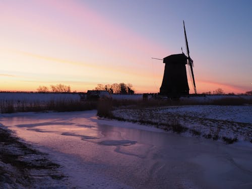 Silhouette of a Windmill during Sunset