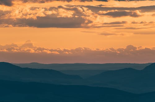 Silhouette of Mountains during Sunset