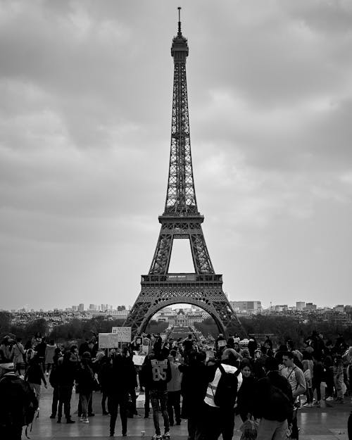 Grayscale Photo of People at the Eiffel Tower