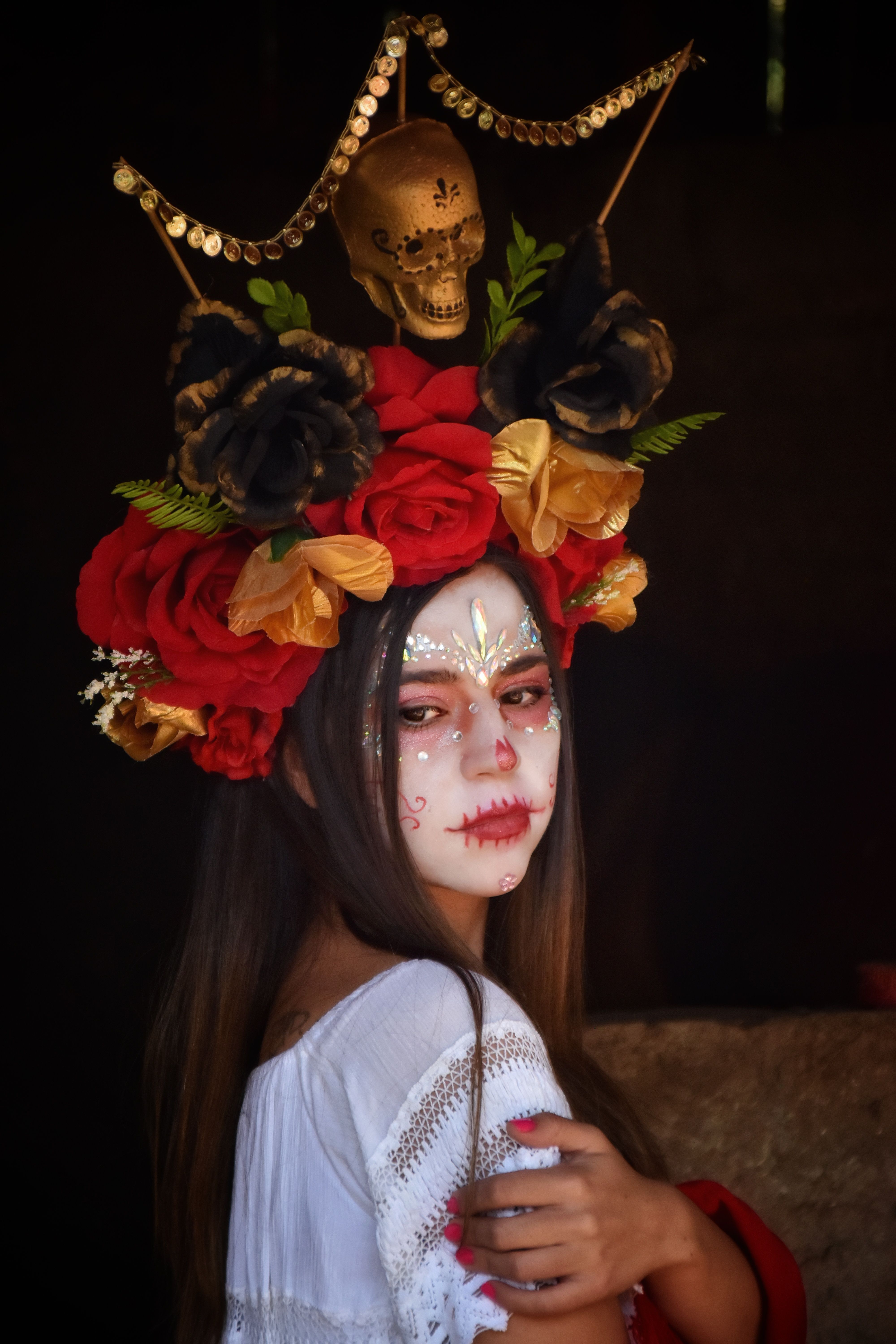 woman-in-traditional-costume-for-dia-de-muertos-free-stock-photo