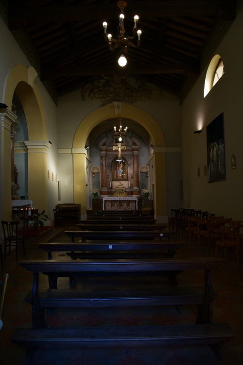 Free Elegant view of a church interior with pews and altar in Monzambano, Italy. Stock Photo