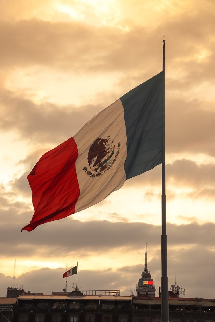 A Mexican Flag On A Pole