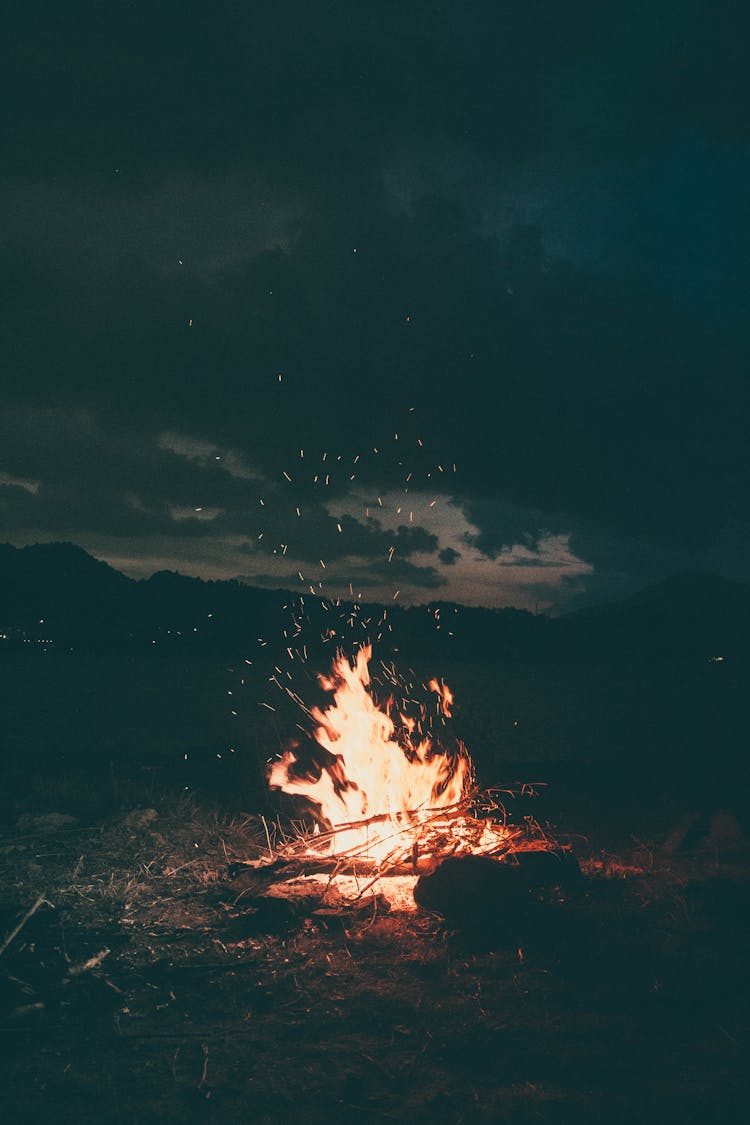 Lit Bonfire Outdoors During Nighttime