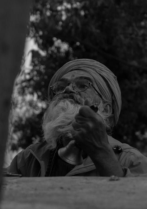 Grayscale Photo of an Elderly Man 