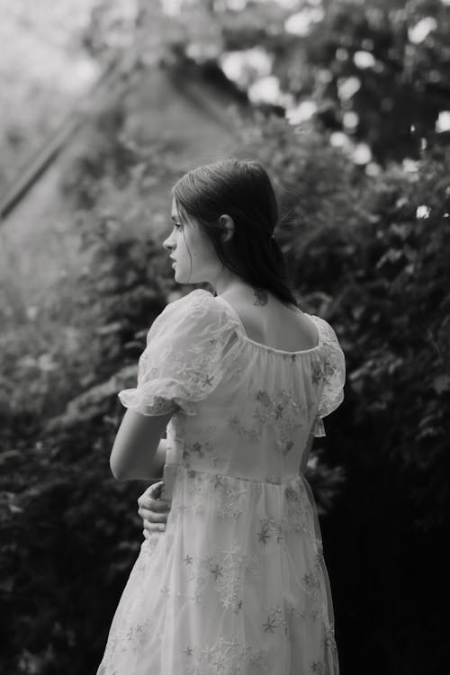 Grayscale Photo of Woman in Floral Dress