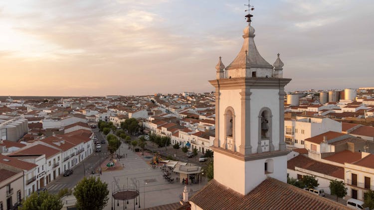 Aerial View Of A Town And Church Tower  