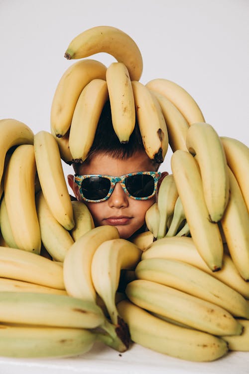 grátis Foto profissional grátis de bananas, criança, descolado Foto profissional