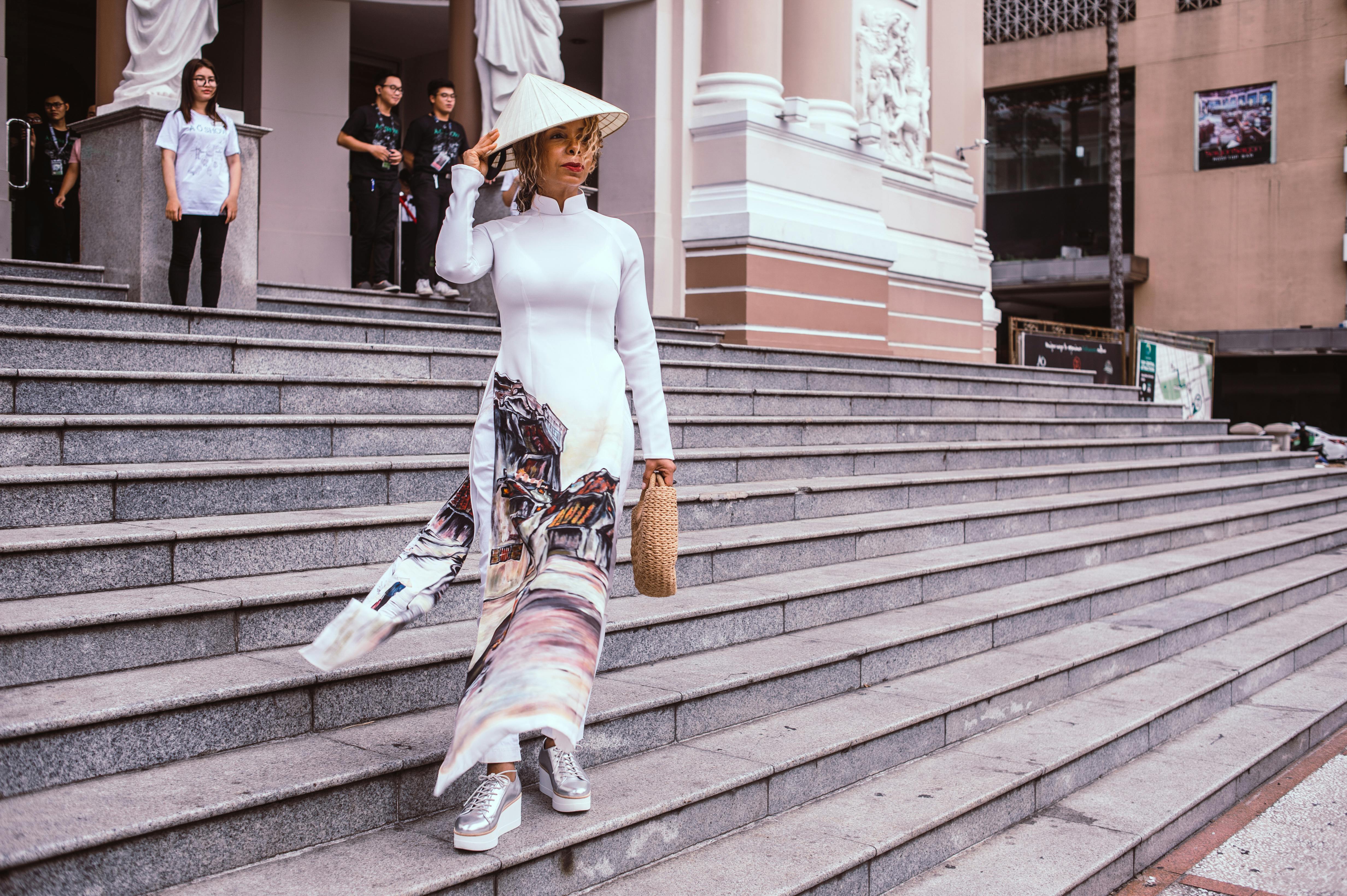 woman standing on stairs