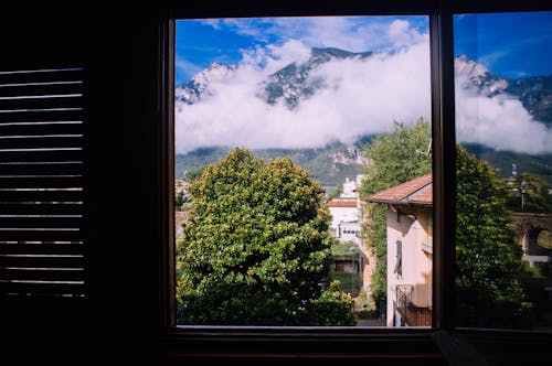 Free Cloudy Mountain from Window Stock Photo