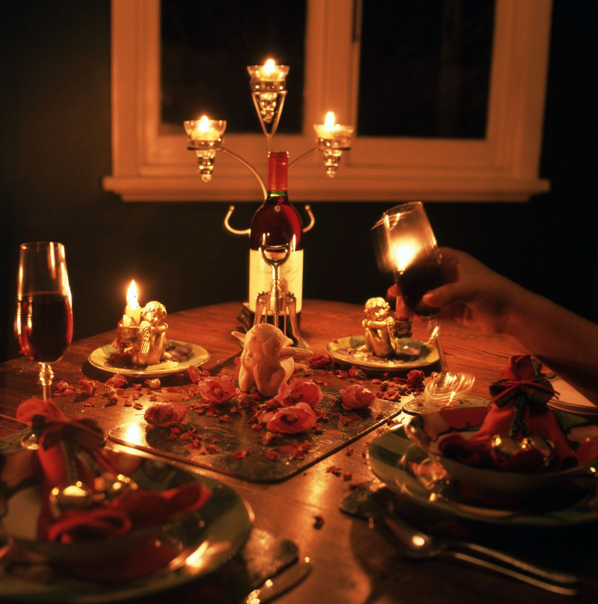 A candlelit table set for two
