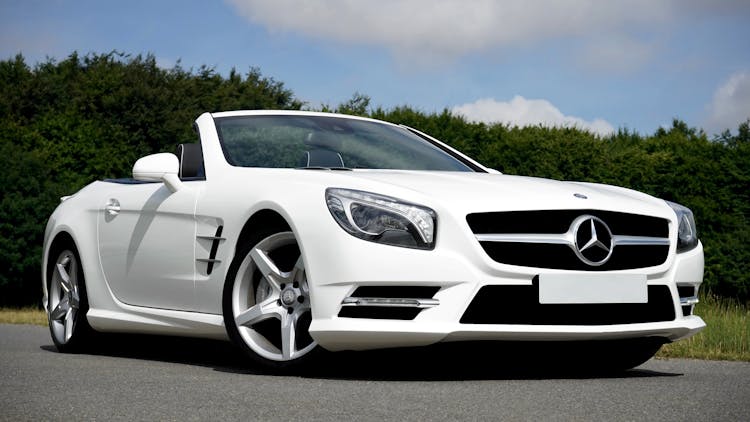 White Mercedes Benz Convertible Coupe