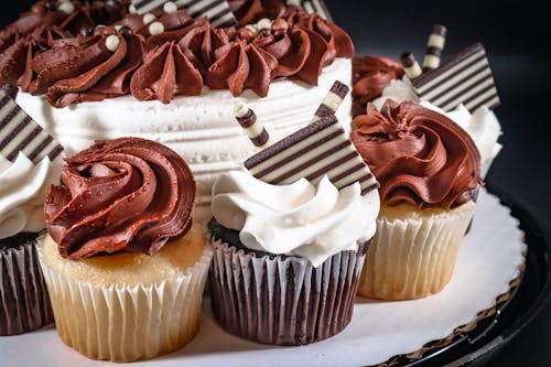 Close-Up Shot of Delicious Cupcakes with Icing on Top