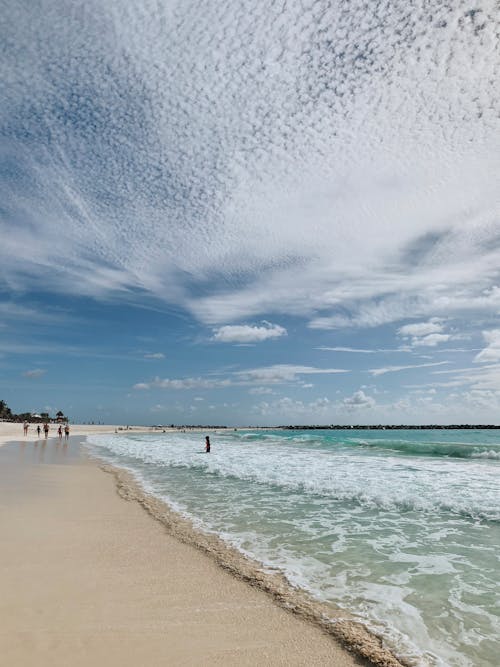 Photo of Beach under Blue Sky