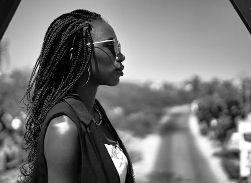 Black and White Photo of Woman Wearing Sunglasses