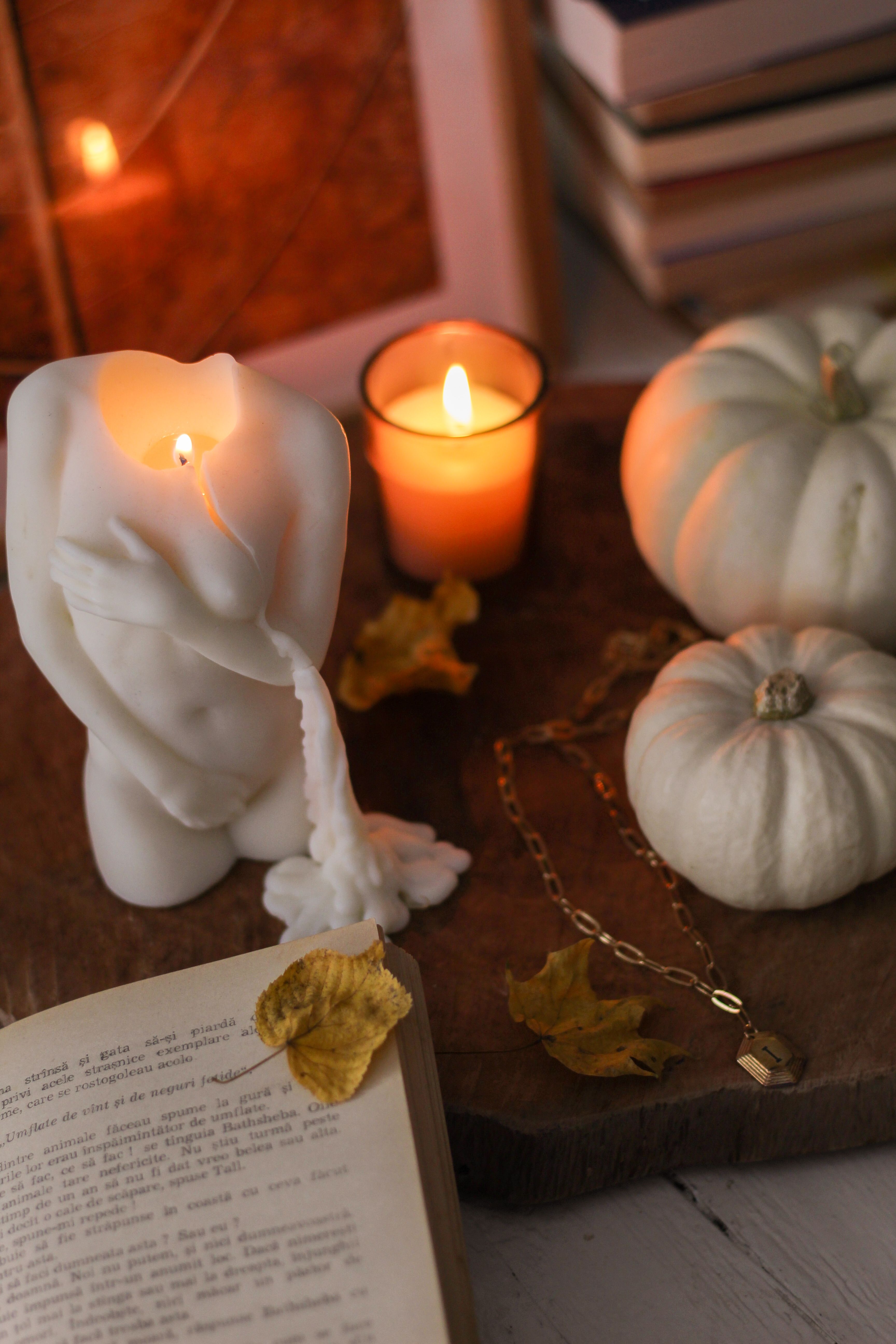 Autumn Concept with Lighted Candles Beside White Pumpkins and maple ...