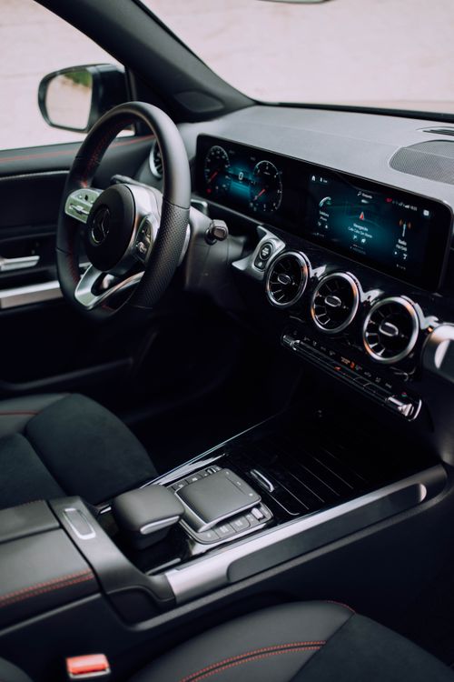Free Modern Mercedes-Benz car interior highlighting digital dashboard and sleek design. Stock Photo