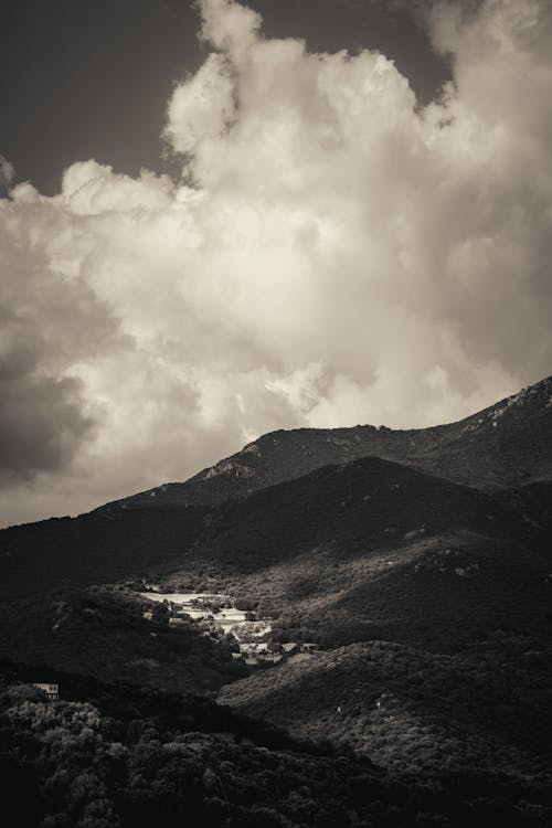 Mountains Under Cloudy Sky