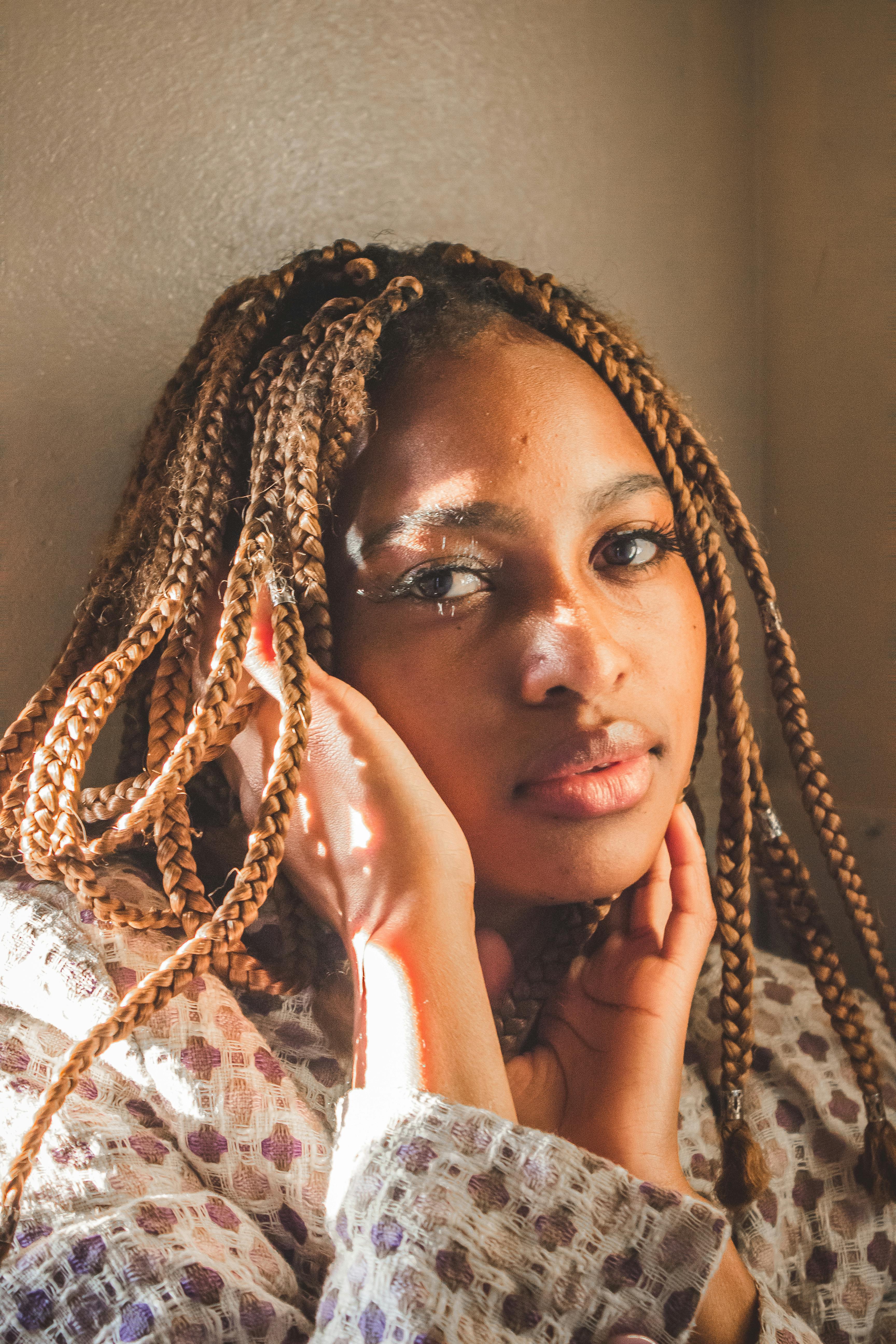 Close-up Photo of Woman with Braided Hairs · Free Stock Photo