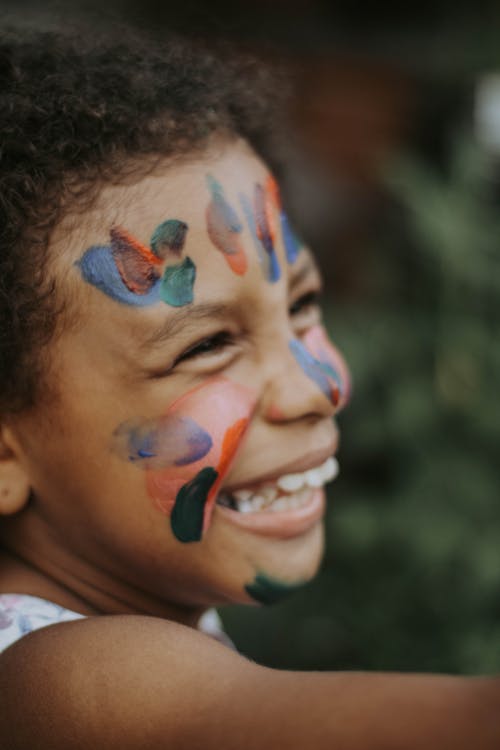 A Girl with Paint on Her Face