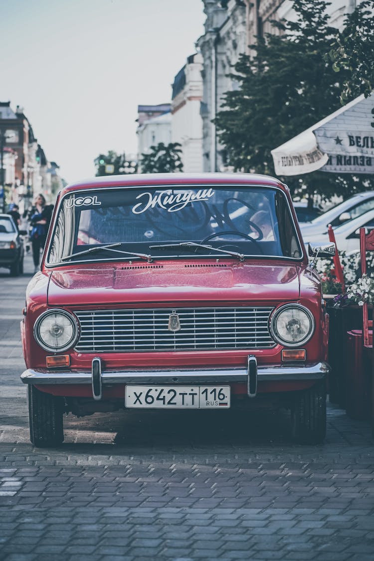 Red Classic Car Parked On The Street