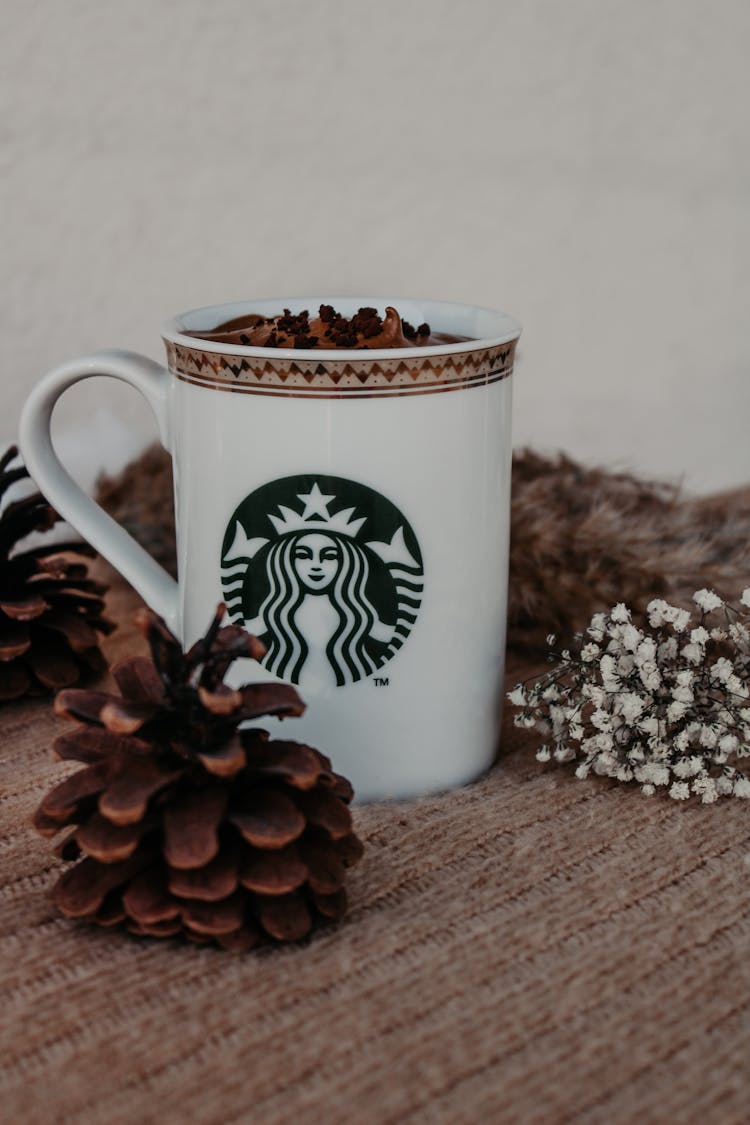 Cone Near Cup With Starbucks Logo