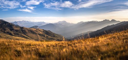 Free Vast landscape view of mountains and fields in La Madeleine, France at sunrise. Stock Photo