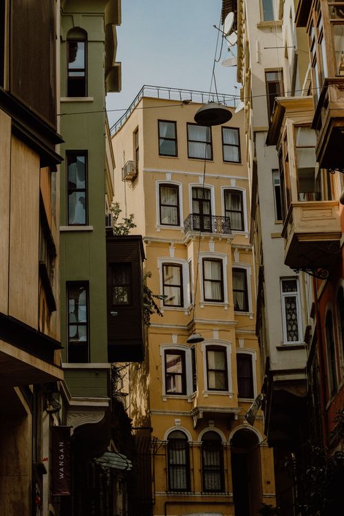Free A picturesque view of colorful historic buildings in a narrow alleyway in Istanbul, Turkey. Stock Photo