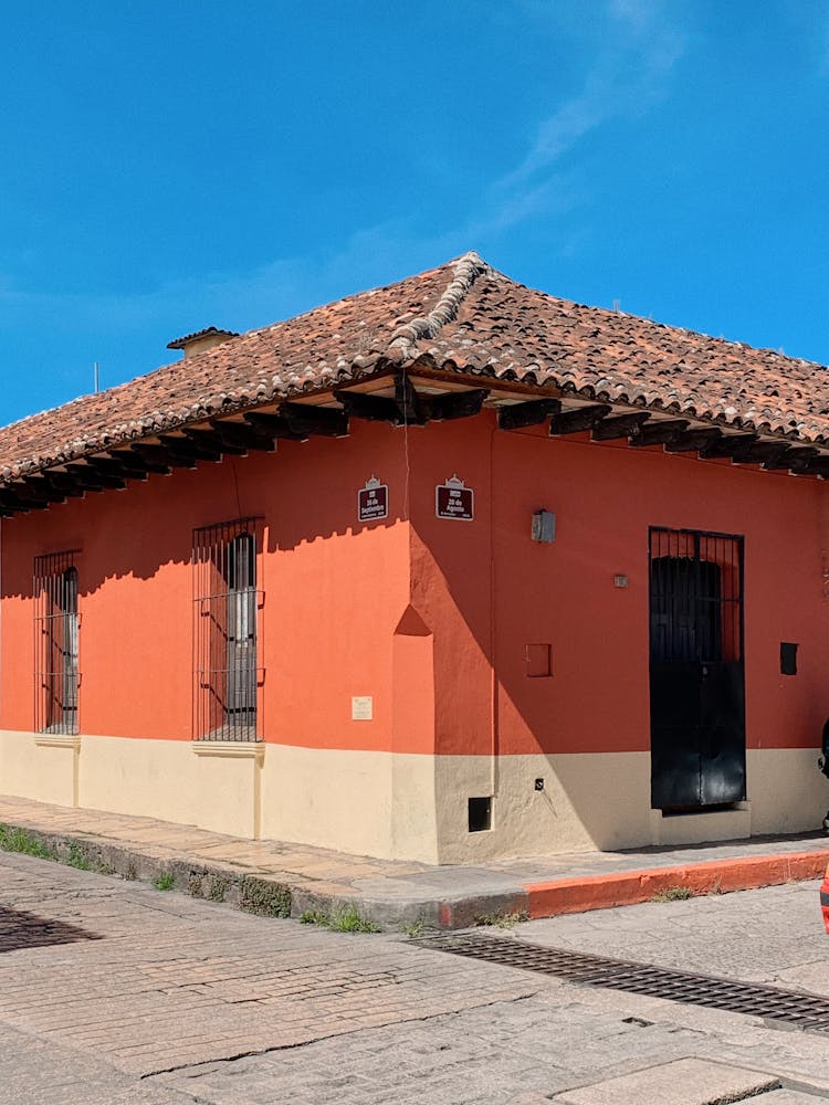 Traditional House On Blue Sky Background