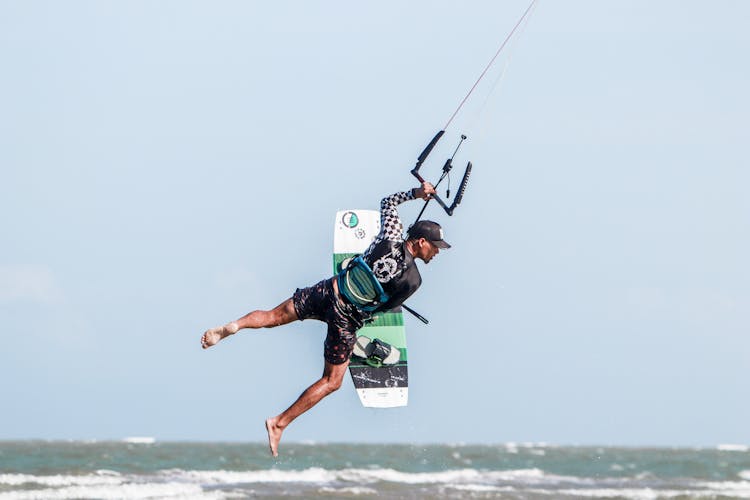 Kiteboarder Suspended In Mid Air