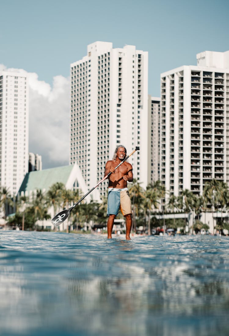 Man On A Paddle Board In The Sea