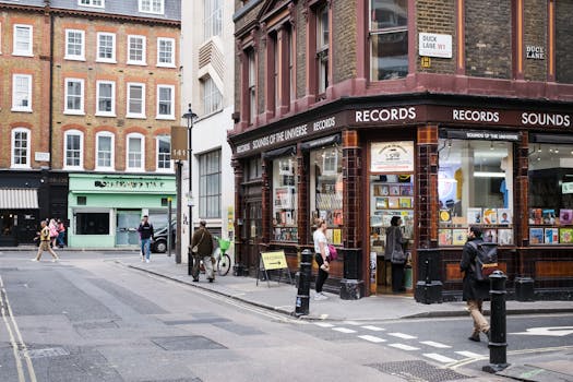 Vibrant London street with pedestrian traffic and iconic record store.