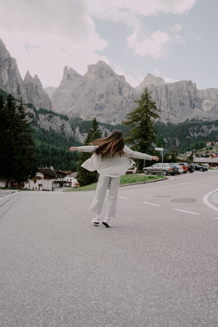 Woman Jumping On The Road