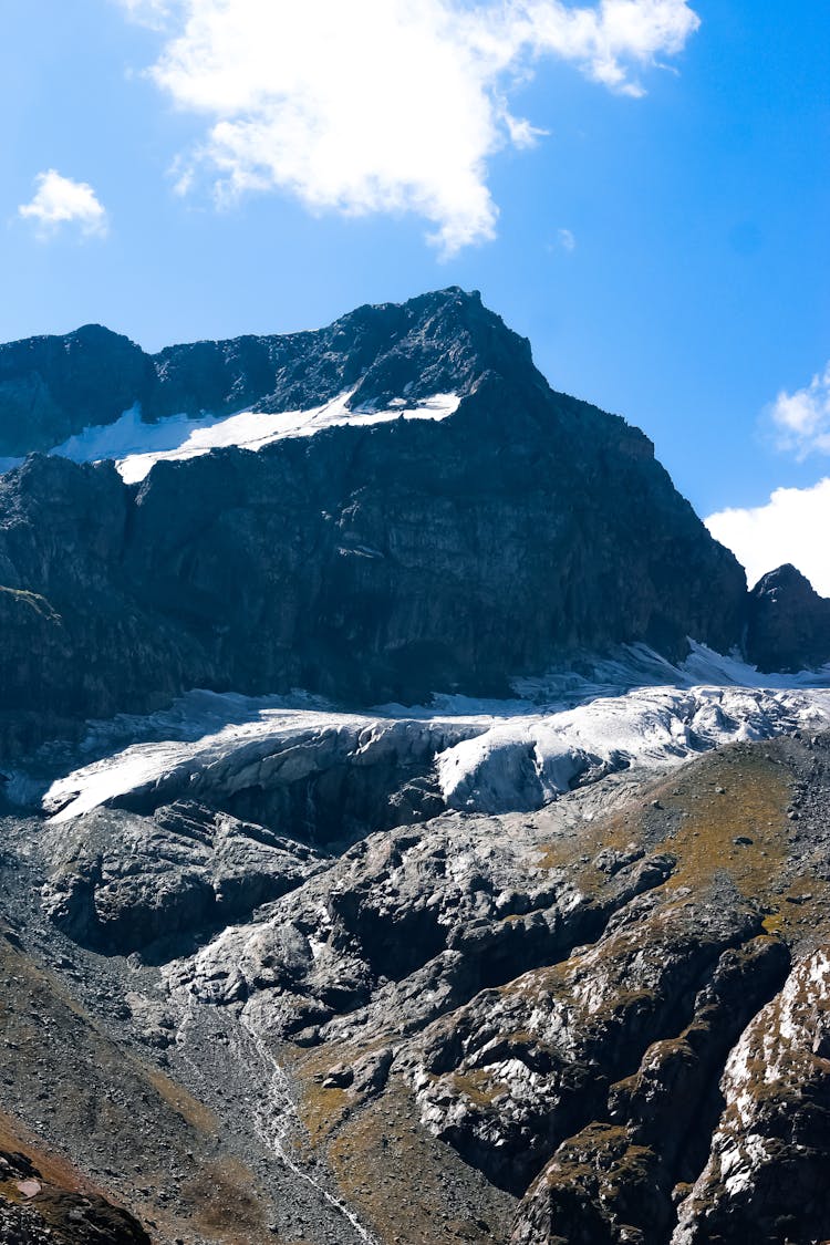 Mountains In Snow Against Blue Sky