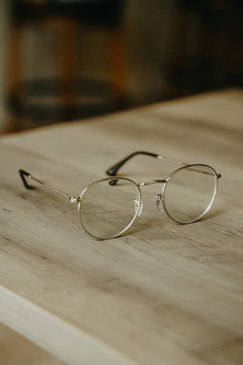 Round Eyeglasses on a Table 