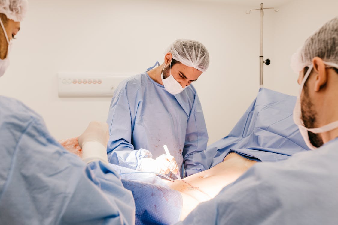 Free A Surgeon Operating on a Patient Stock Photo