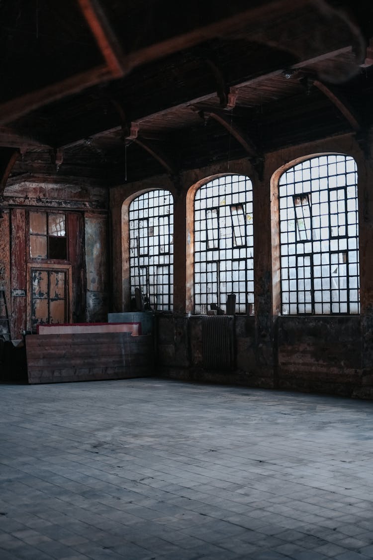 Indoors On Abandoned Old Building With Big Windows