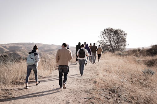 Free People Walking on a Hiking Trail Stock Photo