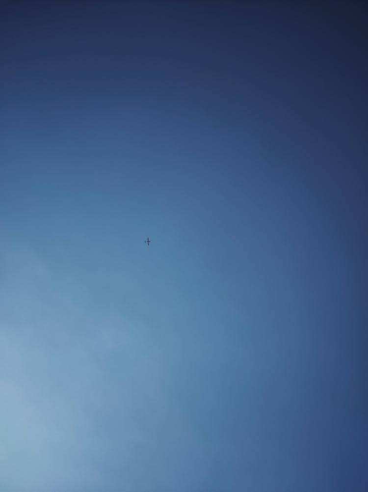 Airplane In The Blue Sky